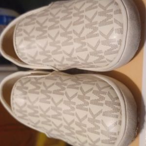 Michael Kors size 9c off white loafer.